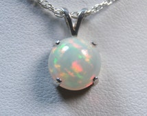 Popular items for welo opal necklace on Etsy