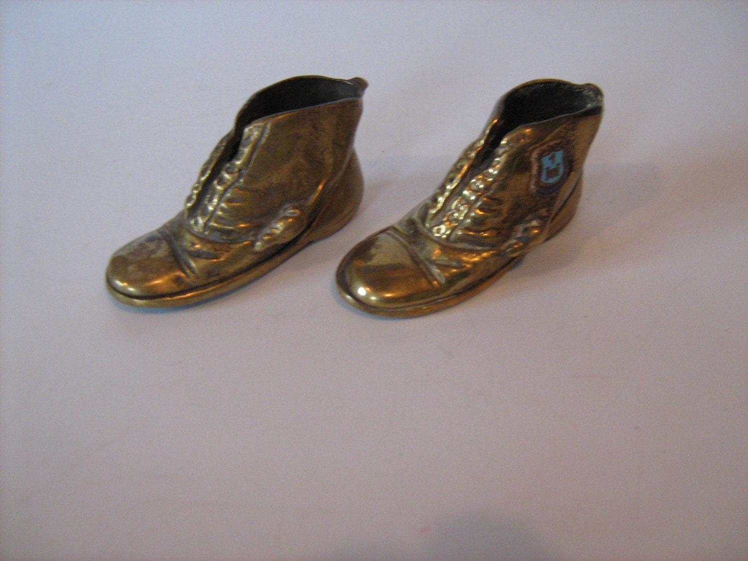Two Vintage Solid Brass Shoes