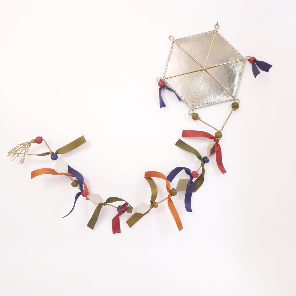 The colorful kite handcrafted wall hanging metal