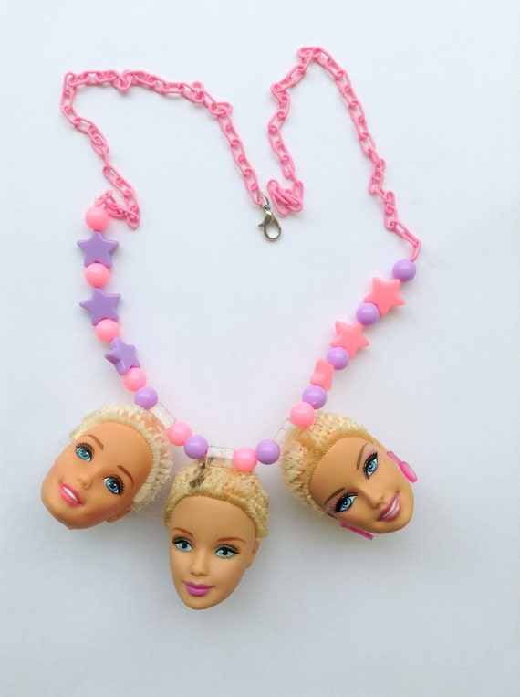 Items similar to Triple barbie head necklace on Etsy