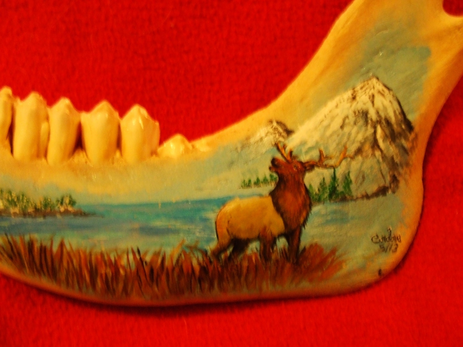 elk painted on buffalo jaw bone by artbyCordova on Etsy