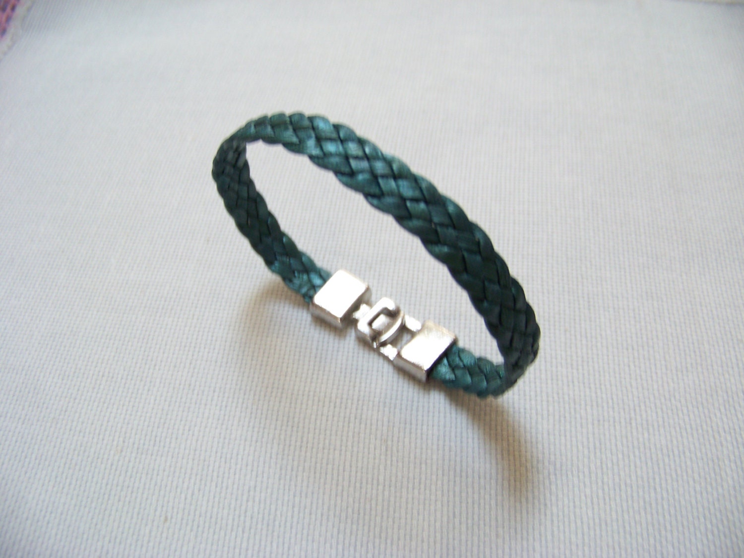 Genuine Leather Cord Bracelet with a Silver Plated Closure.