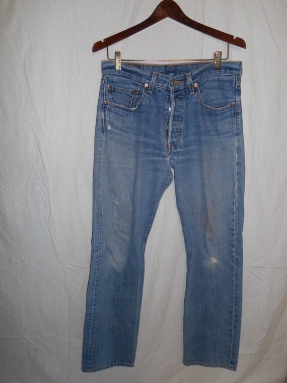 levi jeans with holes in them