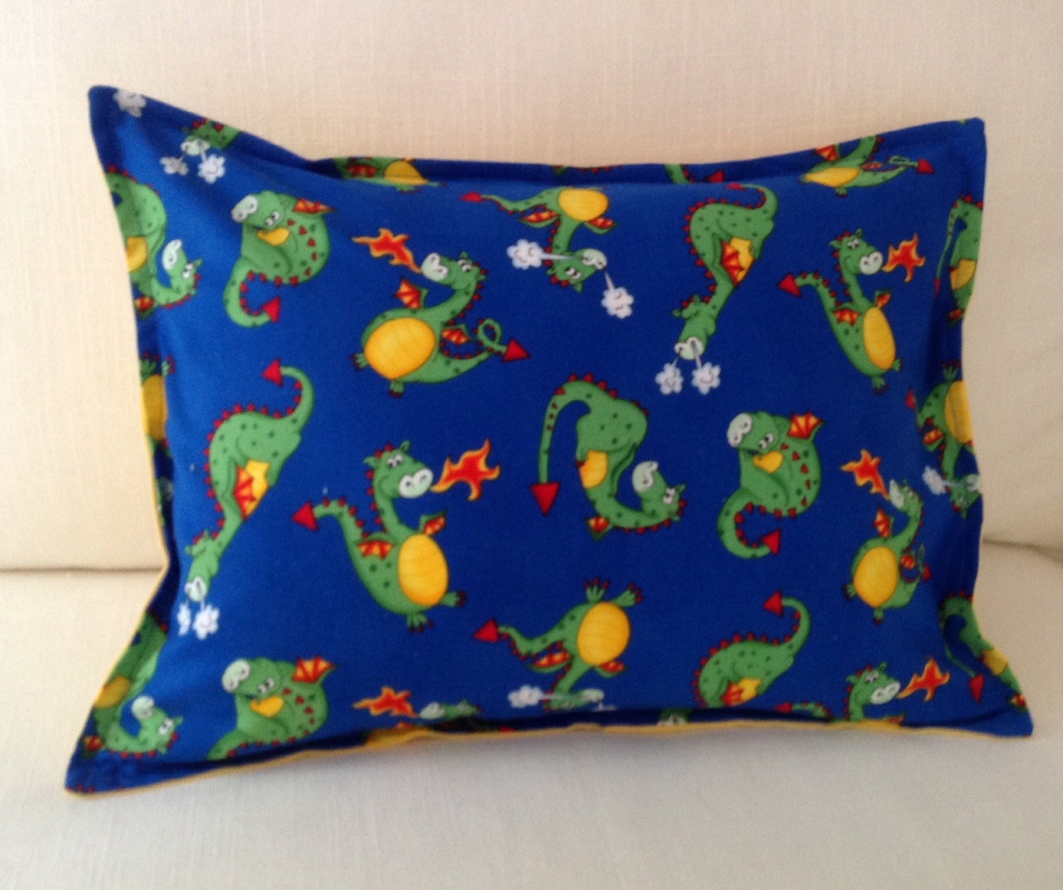 blue dinosaur pillow