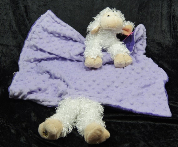 stuffed animal with blanket attached