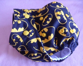 SassyCloth one size pocket diaper with Batman logo on black cotton print. Made to order.