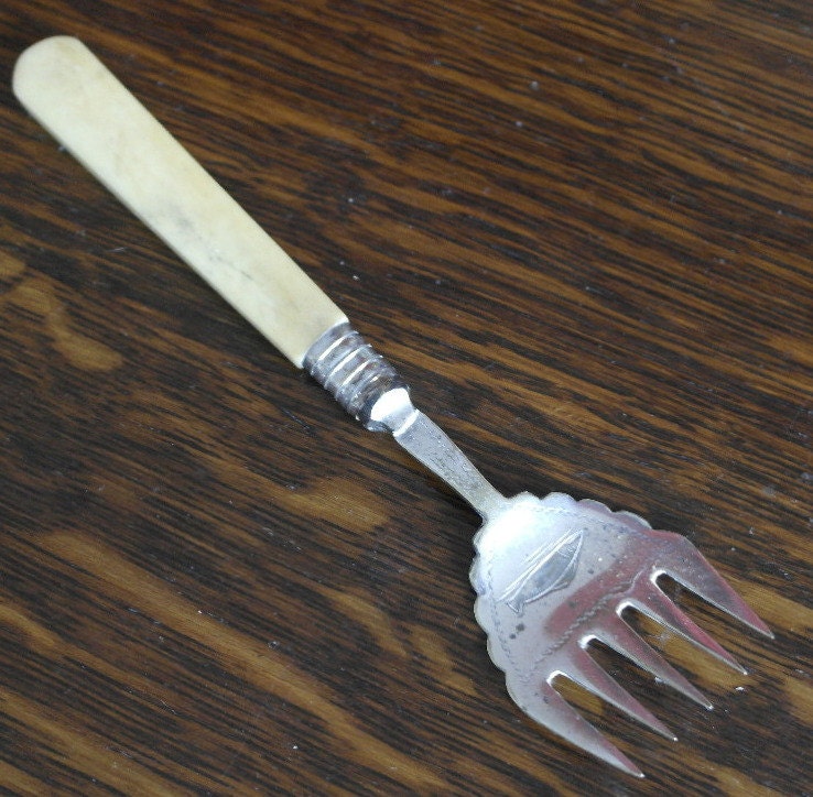 antique bone handle fish serving fork Haute Juice