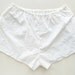Drew / Ivory waist band floral embroidered shorts
