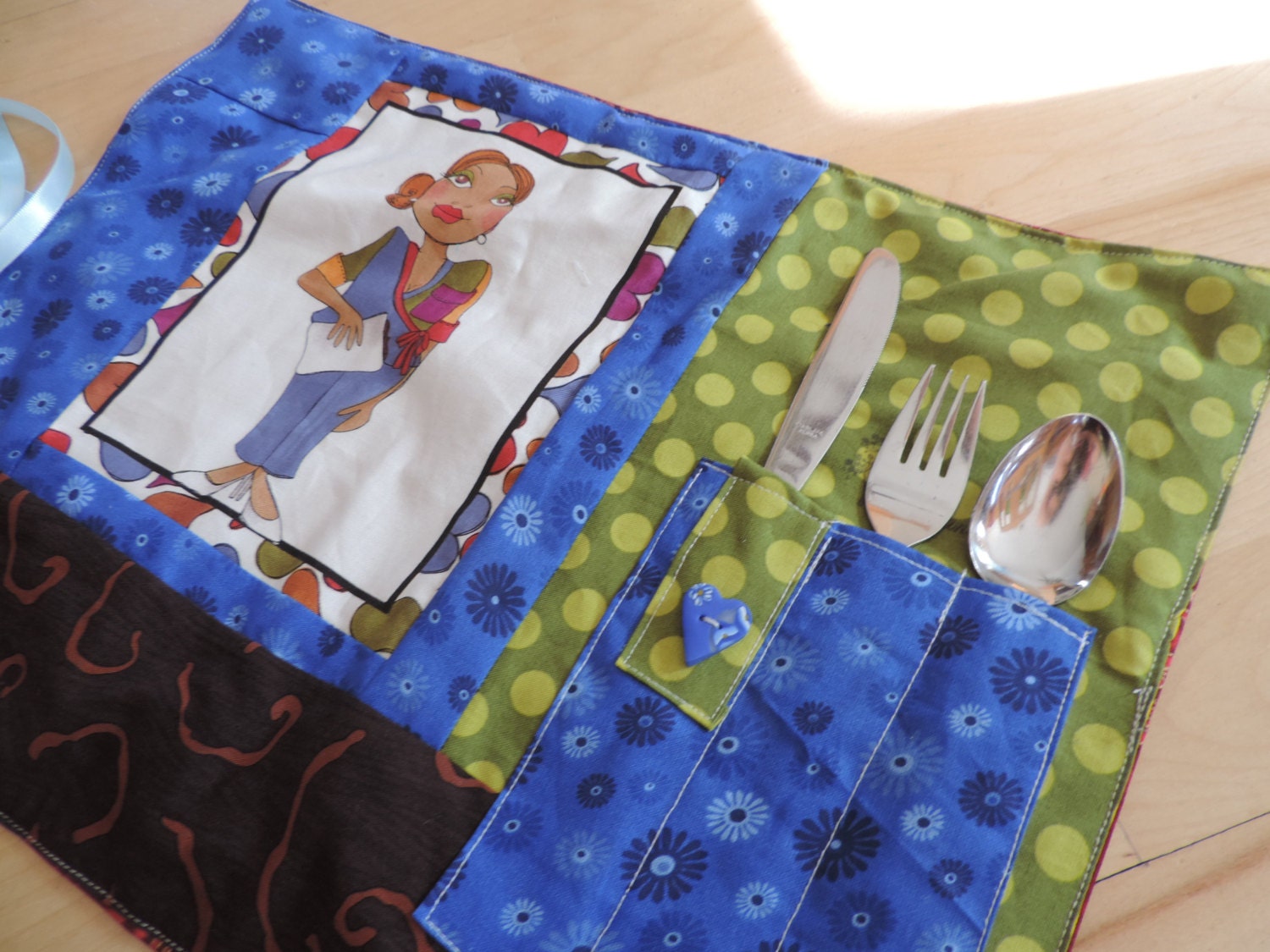 roll placemat with utensil pocket on nurse loralie design