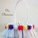On clearance - rainbow tutu flower basket - white basket with red, blue, green, purple, orange, yellow ribbons and flowers, ready to ship