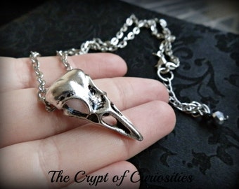Antique silver bird skull necklace.