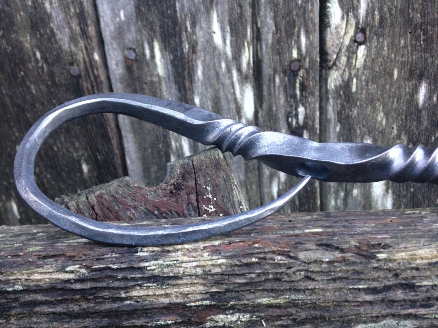 Hand forged iron fire poker