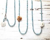 Button button who's got the button? Indonesian trade wind beads and vintage MOP buttons necklace. Handmade OOAK by ladeDAH!