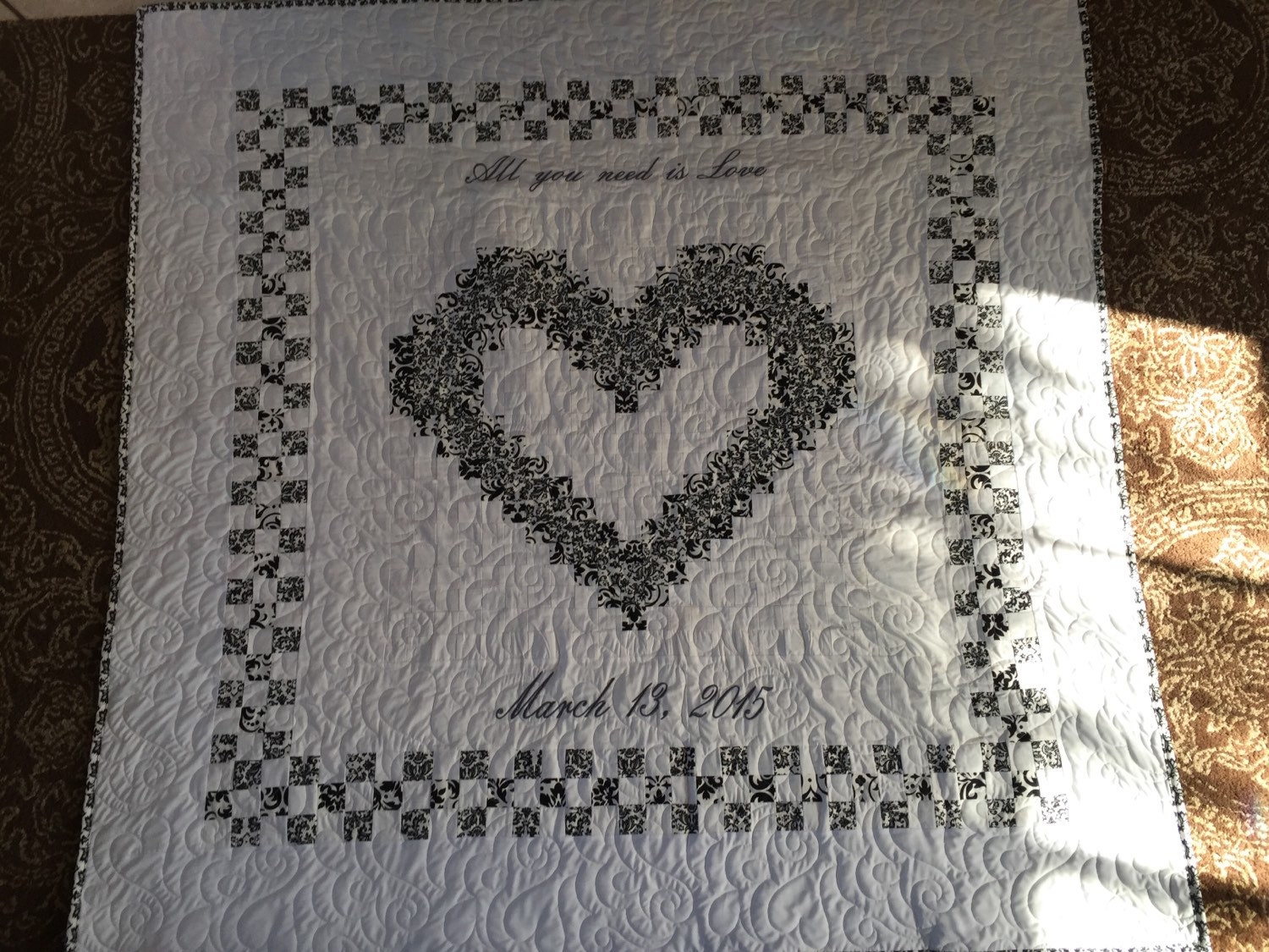Embroidered borders for heart quilt
