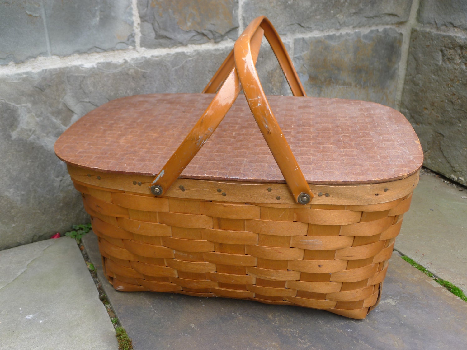 Woven wood basket with metal handles