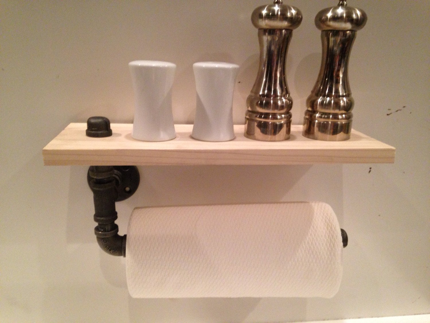 Industrial black pipe paper towel holder by CUTTINGEDGECRAFTSMEN