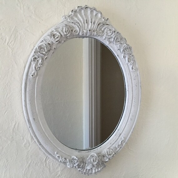 large ornate oval mirror large distressed white