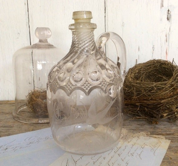 Antique patterned glass bottle with etching and monogram