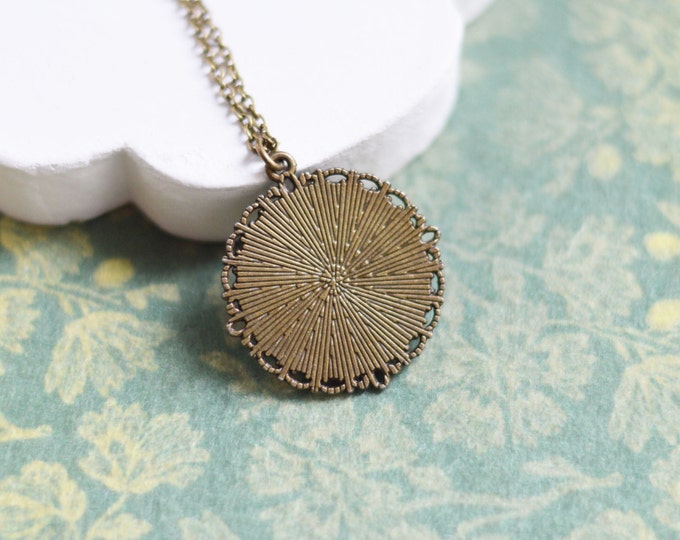 Travel // Round pendant metal brass with the image under the glass // Retro, Vintage, Rustic // Brown, Beige, Green // Attraction