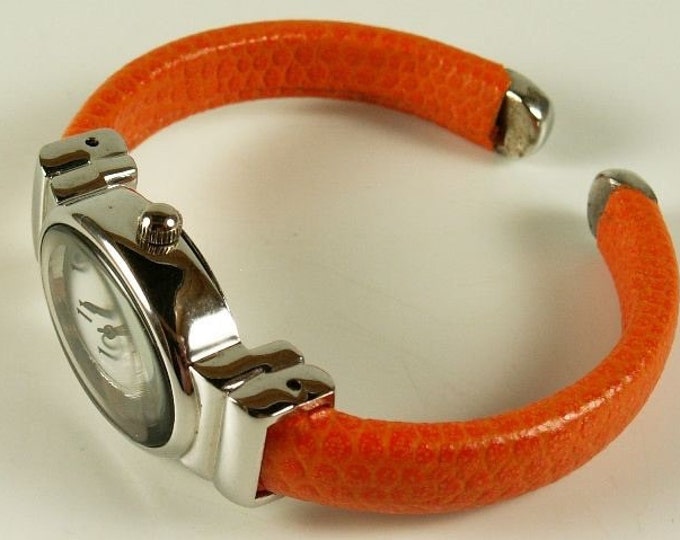 Storewide 25% Off SALE Ladies Vintage Geneva White Bezel Quartz Watch Featuring a Unique Orange Layered Cuff Bracelet Clamp Band