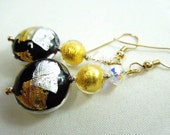 Silver,gold and black Murano glass earrings with gold filled earrings.