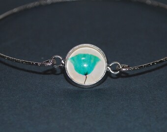 Silver bracelet - blue flowers on white background