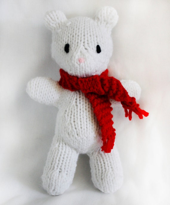 teddy bear with red scarf