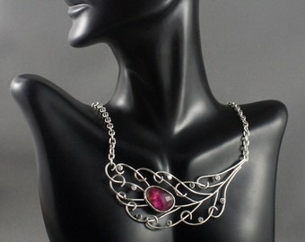 Jewelry with meaning. Sterling silver Peacock Feather necklace. Pink tourmaline jewelry. Elegant jewelry.