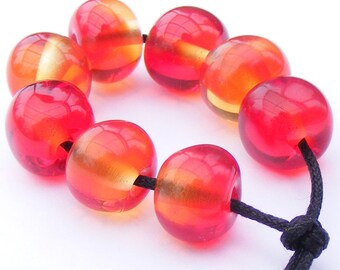 Bi-coloured lampwork bead set of 8 red and orange curvy cube glass beads