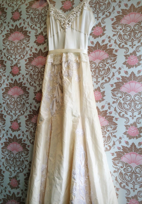 ivory & cream beaded and embroidered wedding dress by mermaid