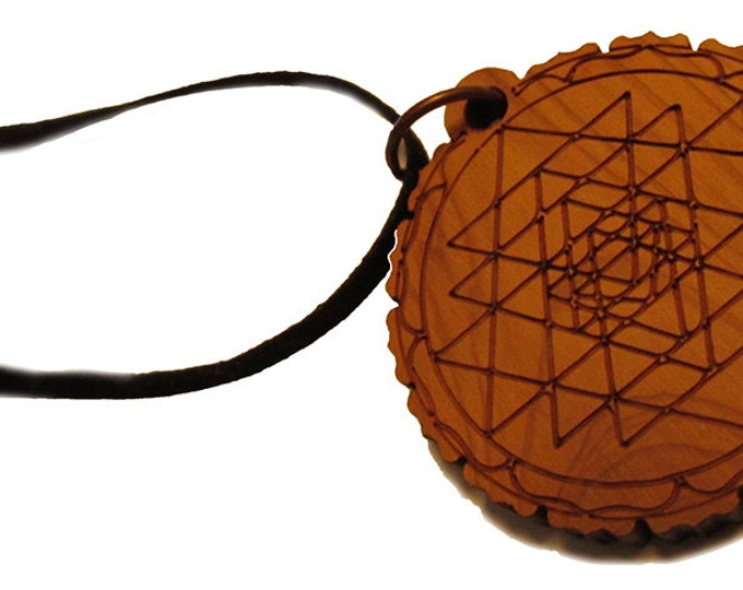 SRI YANTRA Pendant necklace carved on cedar wood
