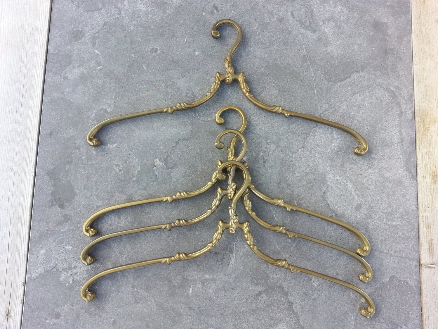 One antique brass clothes hanger dress hanger Haute Juice