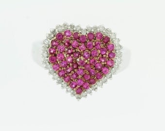 Pink Sapphire and Diamond Ring .