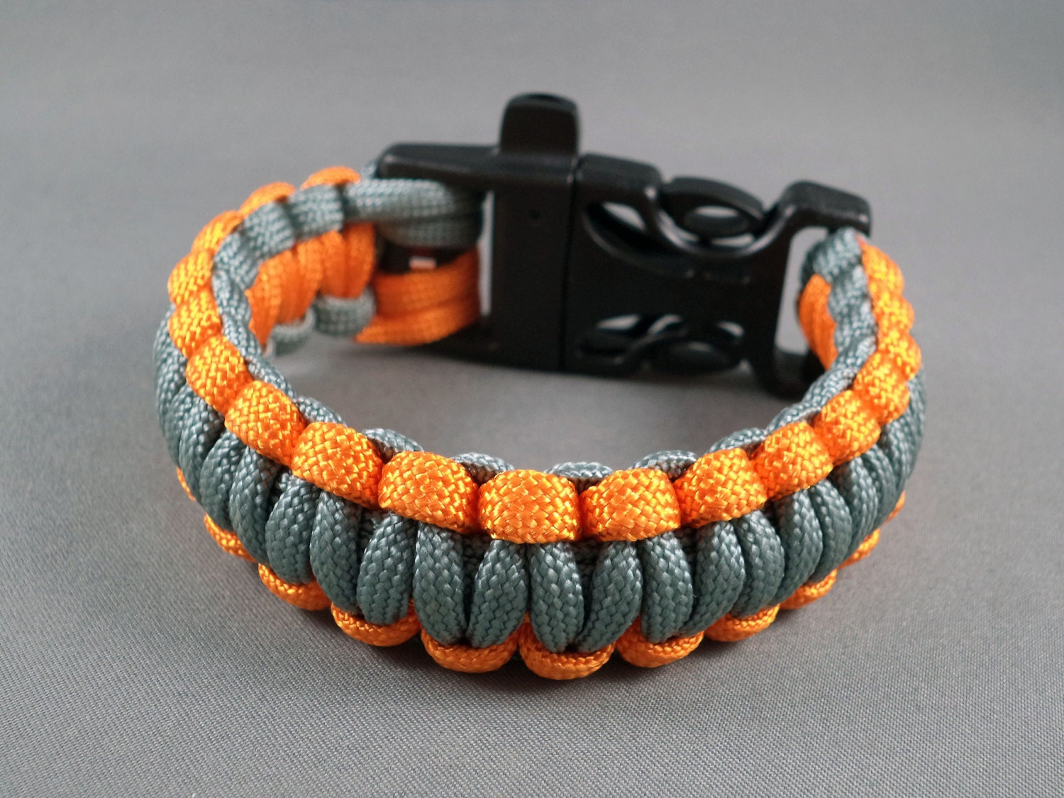 8 inch orange and gray paracord survival bracelet with