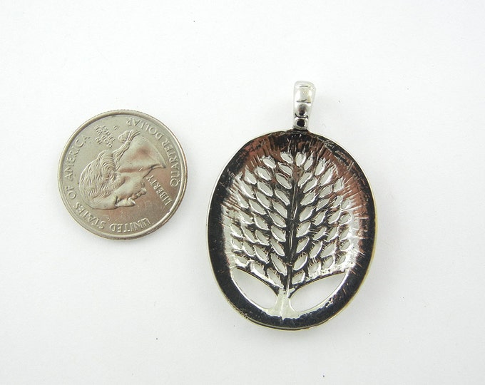 Bright Silver-tone Oval Tree of Life Pendant