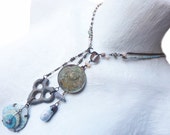 Redivivus. Double focal lariat necklace with ancient and found artifacts.