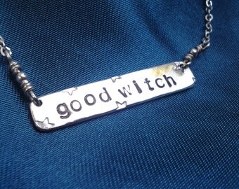 good witch, bad witch necklace in sterling silver