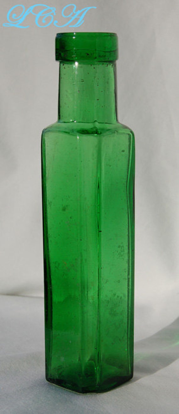 Fancy Antique CAPERS BOTTLE. Beautiful Emerald Green color