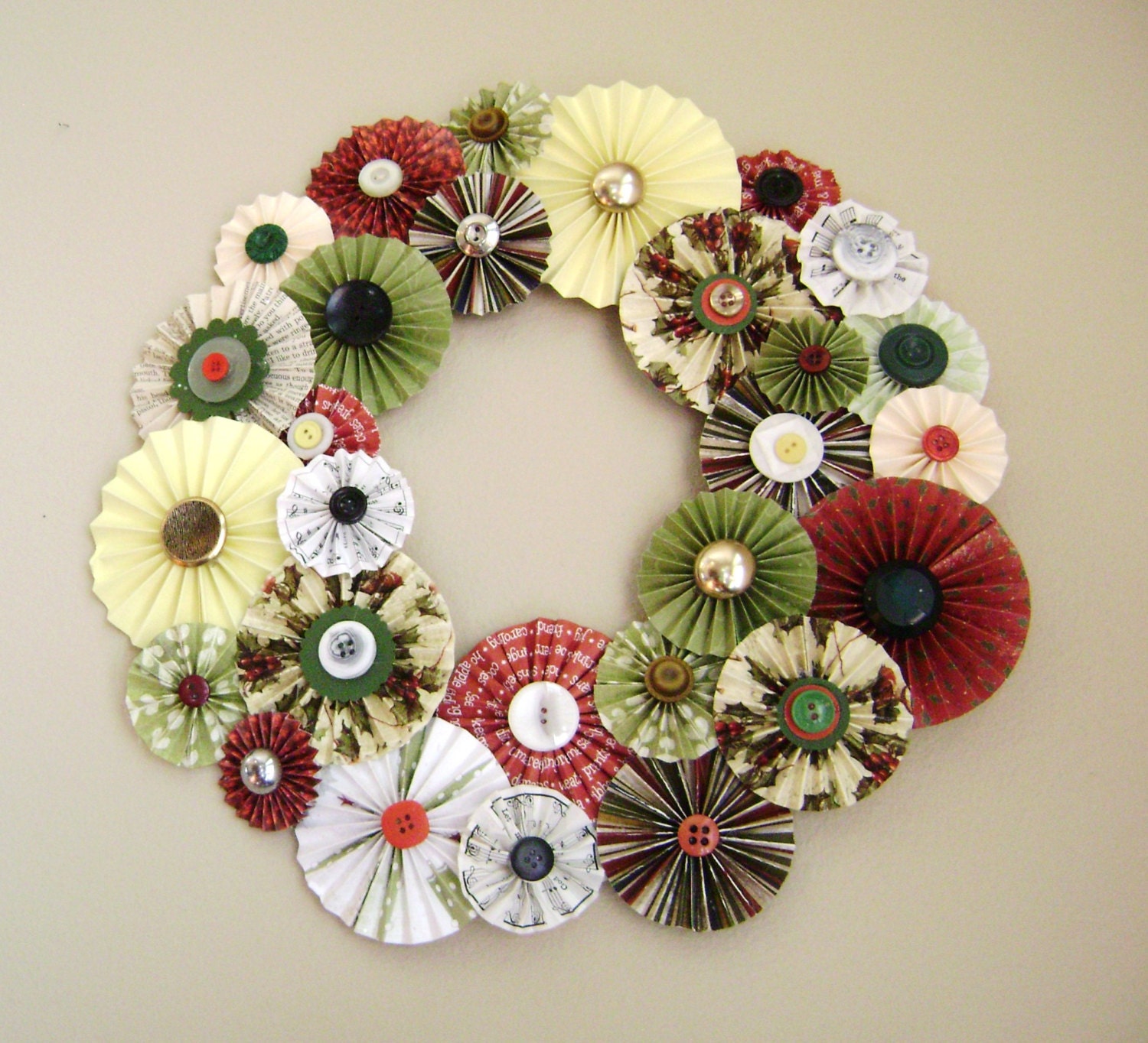 Christmas wreath red green,yellow, vintage book page and sheet music fan fold accordian style pinwheel button centers
