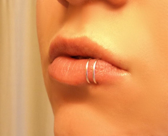 Each one is handmade from 14k Gold Filled, Sterling Silver or Rose Gold Filledhigh quality jewelers wire. Tiny hoops that are easy and comfortable to wear. Fake Nose Ring Faux Nose Ring Fake Lip Ring Fake Nose Ring Sterling Silver Gold Rose Gold Custom Boho Festival Body Jewelry Gift Man Woman.