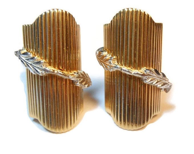 Swank cuff links, Art Deco two toned domed and ribbed with silver leaves overlaying the domed gold