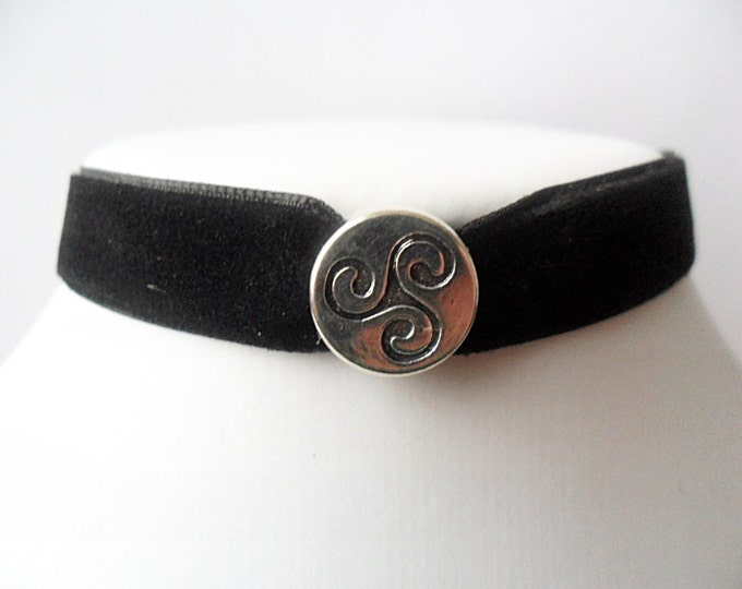 Black velvet choker necklace with celtic triskelion triskele charm with a width of 3/8"inch.