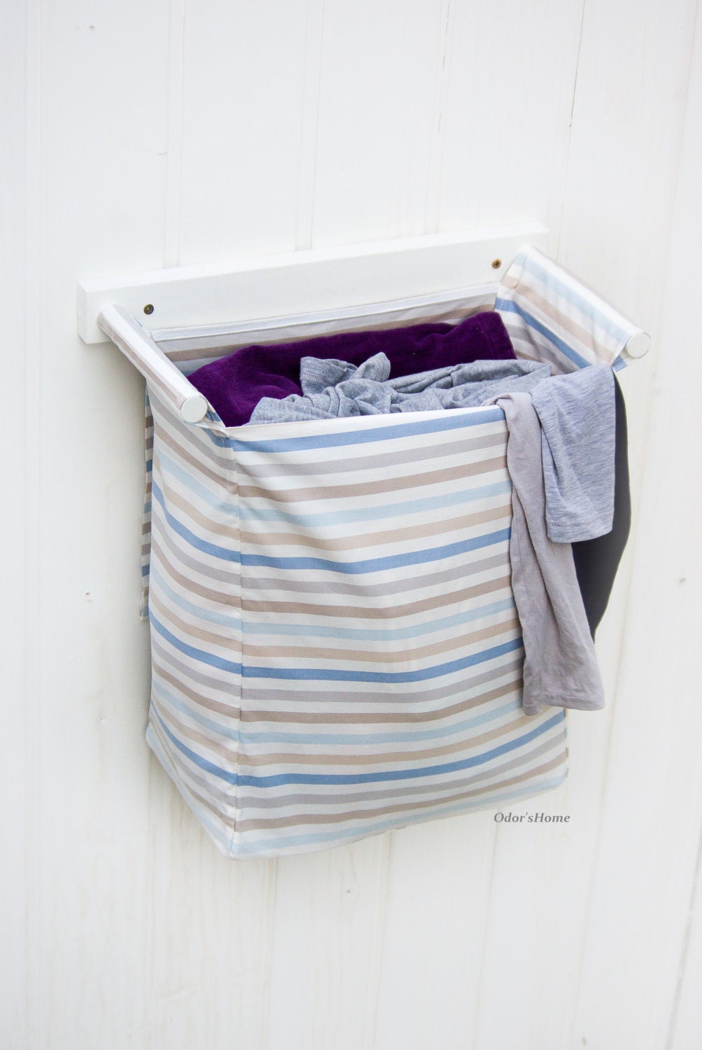 Wall mounted laundry basket for nursery organization by OdorsHome