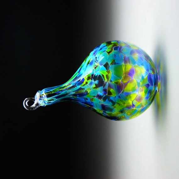 hand made blown glass teardrop ornament in tones of purple