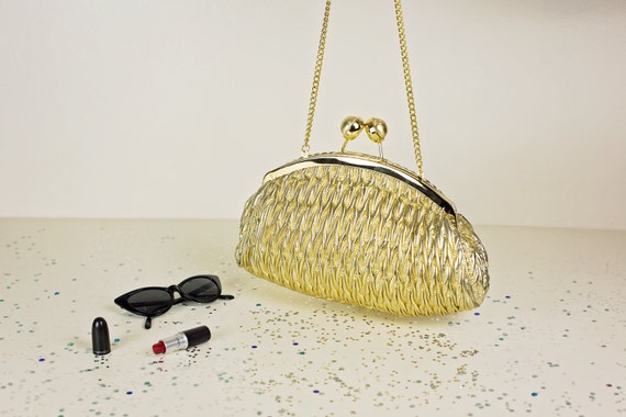 gold oversized clutch bag