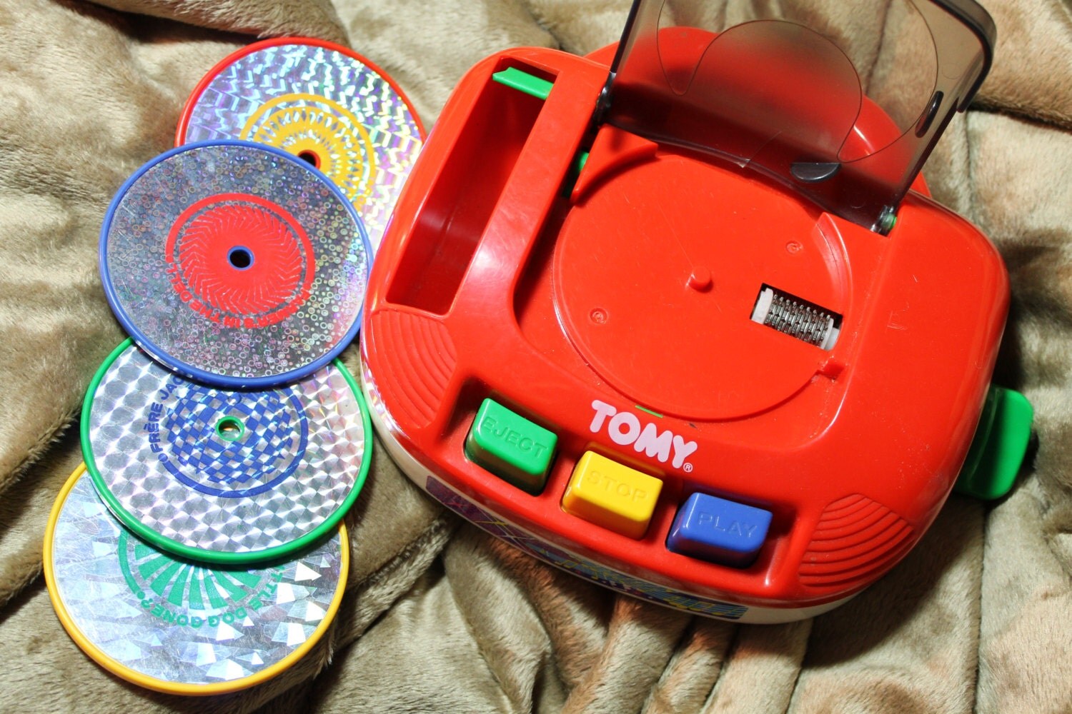 Vintage Tomy Toy Musical Record Player with 4 records plays