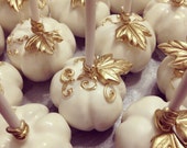 White and gold pumpkin cake pops