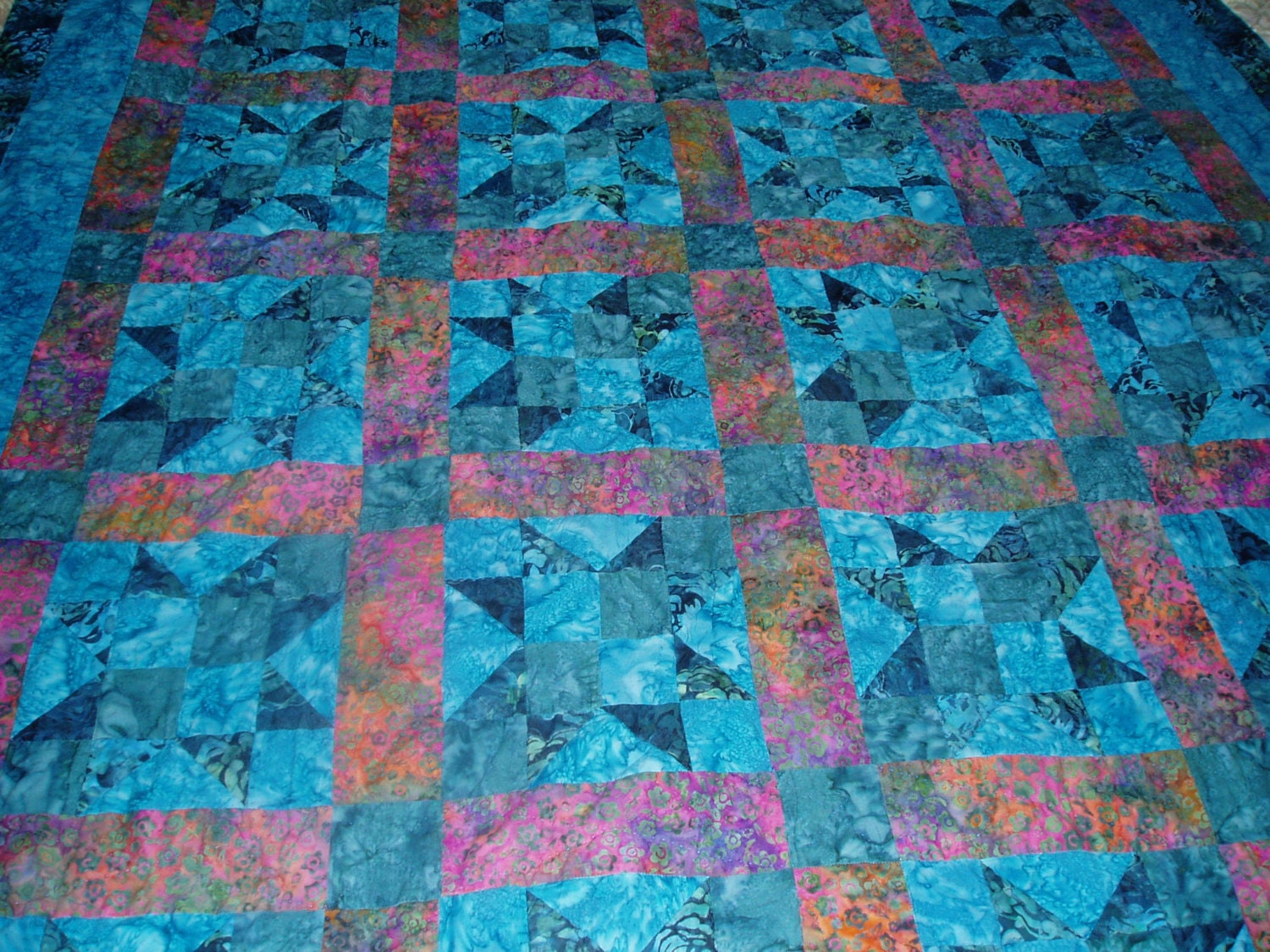 Lap quilt in turquoise star pattern Hand Quilted custom colors