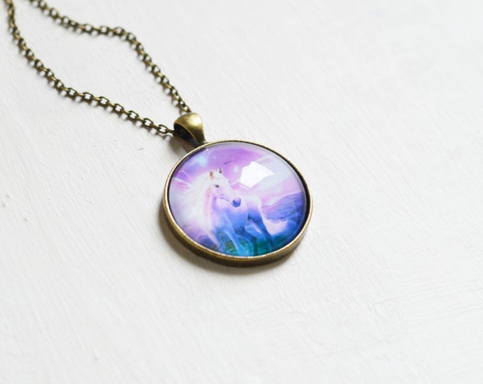 Magic Night // Round pendant metal brass with Pegasus under glass // A horse with wings // Purple, pink, blue, violet