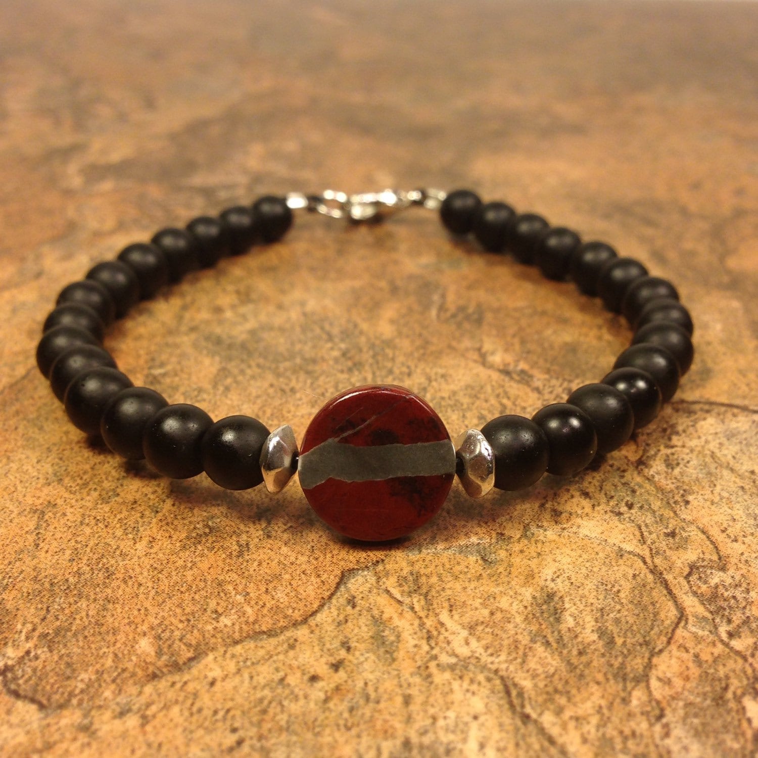 Serpentine stone bracelet with black glass beads beaded